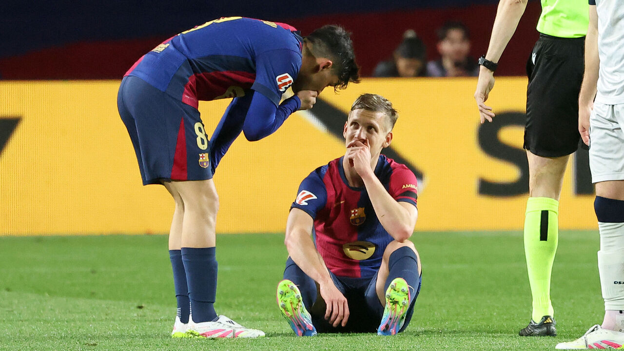 Dani Olmo is injured during the match between FC Barcelona and Club Atletico Osasuna in Barcelona, Spain, on March 27, 2025, corresponding to week 27 of LaLiga EA Sports, played at the Lluis Companys Stadium.