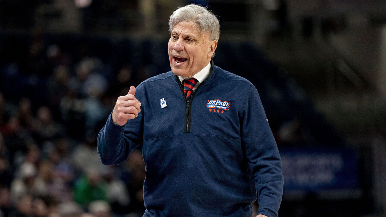 CHICAGO, IL - FEBRUARY 25: DePaul Blue Demons head coach Doug Bruno shouts at a player to sub in during the women's college basketball game between the UConn Huskies and the Depaul Blue Demons on February 25, 2024, at Wintrust Arena in Chicago, IL.