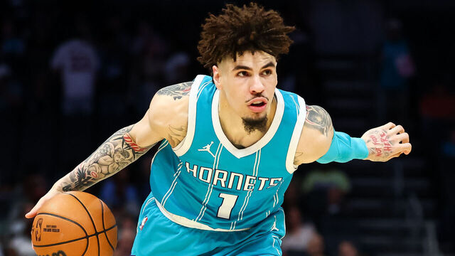CHARLOTTE, NORTH CAROLINA - MARCH 25: LaMelo Ball #1 of the Charlotte Hornets controls the ball during the first half of a basketball game against the Orlando Magic at Spectrum Center on March 25, 2025 in Charlotte, North Carolina.