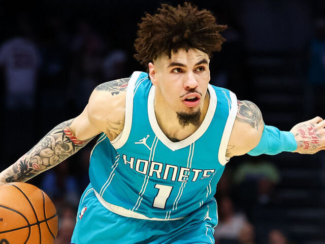 CHARLOTTE, NORTH CAROLINA - MARCH 25: LaMelo Ball #1 of the Charlotte Hornets controls the ball during the first half of a basketball game against the Orlando Magic at Spectrum Center on March 25, 2025 in Charlotte, North Carolina.
