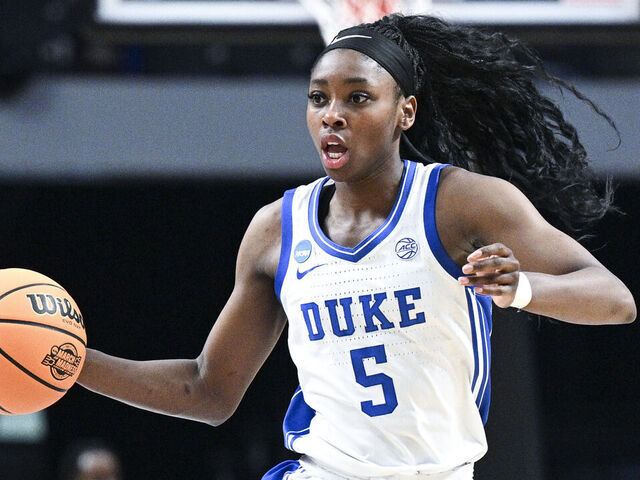 BIRMINGHAM, ALABAMA - MARCH 28: Oluchi Okananwa #5 of the Duke Blue Devils dribbles the ball during game against the North Carolina Tar Heels in the Sweet Sixteen round of the 2025 NCAA Women's Basketball Tournament held at Legacy Arena at the BJCC on March 28, 2025 in Birmingham, Alabama.