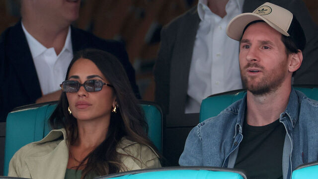 MIAMI GARDENS, FLORIDA - MARCH 28: Antonela Roccuzzo and Lionel Messi watch Novak Djokovic of Serbia play Grigor Dimitrov of Bulgaria during the semifinals of the Miami Open Presented by Itau at Hard Rock Stadium on March 28, 2025 in Miami Gardens, Florida.