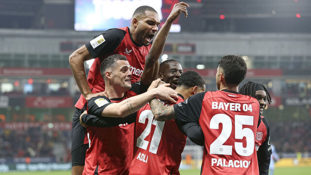 Leverkusen, Germany - March 28: Amine Adli of Bayer 04 Leverkusen celebrates after scoring his team's third goal with teammates during the Bundesliga match between Bayer 04 Leverkusen and VfL Bochum 1848 at BayArena on March 28, 2025 in Leverkusen, Germany.
