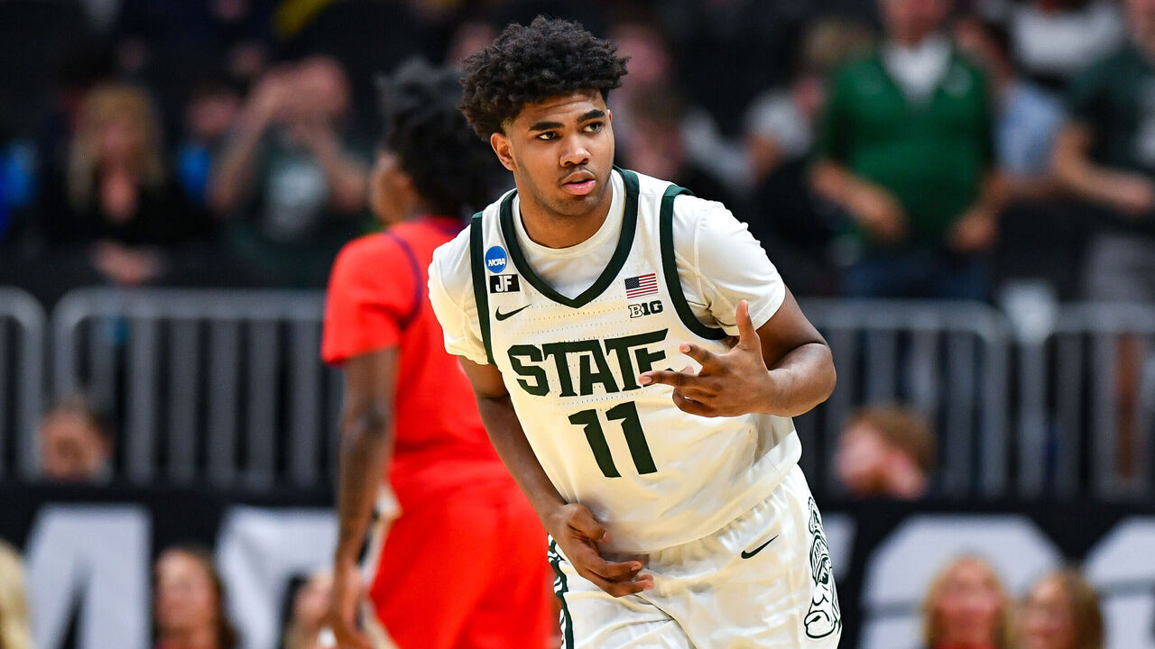 ATLANTA, GA MARCH 28: Michigan State guard Jase Richardson (11) reacts after making a three-pointer during the South Regional Sweet Sixteen round of the NCAA Men's Basketball Tournament game between the Ole Miss Rebels and the Michigan State Spartans on March 28th, 2025 at State Farm Arena in Atlanta, GA.