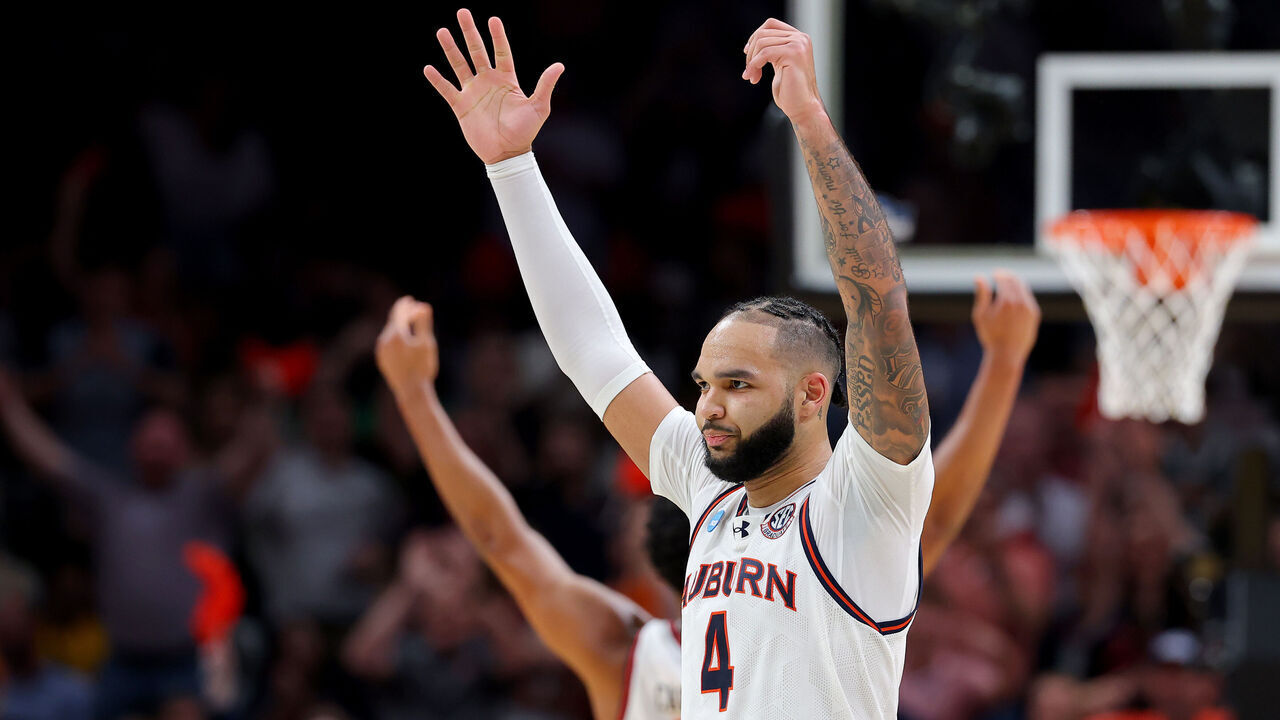 ATLANTA, GEORGIA - MARCH 28: Johni Broome #4 of the Auburn Tigers react during the second half against the Michigan Wolverines in the South Regional Sweet Sixteen round of the NCAA Men's Basketball Tournament at State Farm Arena on March 28, 2025 in Atlanta, Georgia.
