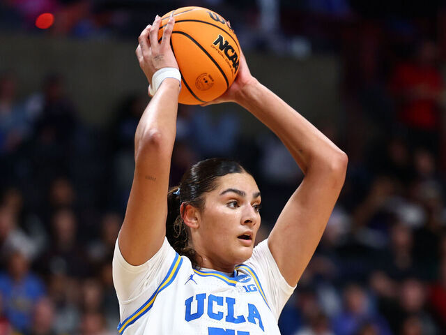 SPOKANE, WASHINGTON - MARCH 28: Lauren Betts #51 of the UCLA Bruins looks to pass the ball in the game against the Ole Miss Rebels during the Sweet Sixteen round of the 2025 NCAA Women's Basketball Tournament held at Spokane Arena on March 28, 2025 in Spokane, Washington.