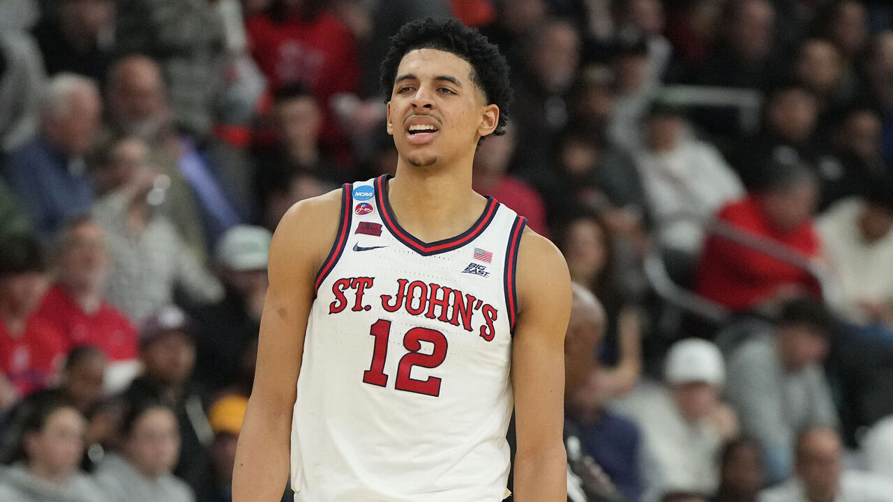 PROVIDENCE, RHODE ISLAND - MARCH 20: RJ Luis Jr. #12 of the St. John's Red Storm looks on during a first round game against the Omaha Mavericks in the NCAA Men's Basketball Tournament at Amica Mutual Pavillion on March 20, 2025 in Providence, Rhode Island.