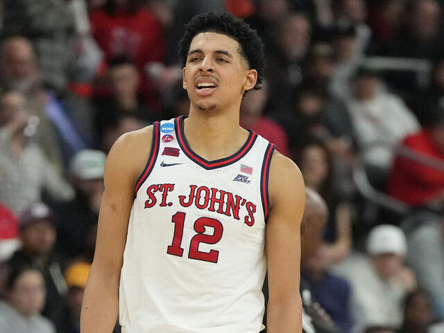 PROVIDENCE, RHODE ISLAND - MARCH 20: RJ Luis Jr. #12 of the St. John's Red Storm looks on during a first round game against the Omaha Mavericks in the NCAA Men's Basketball Tournament at Amica Mutual Pavillion on March 20, 2025 in Providence, Rhode Island.