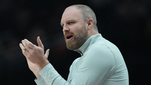 PORTLAND, OREGON - MARCH 19: Head coach Taylor Jenkins of the Memphis Grizzlies encourages his team during the first half against the Portland Trail Blazers at Moda Center on March 19, 2025 in Portland, Oregon.