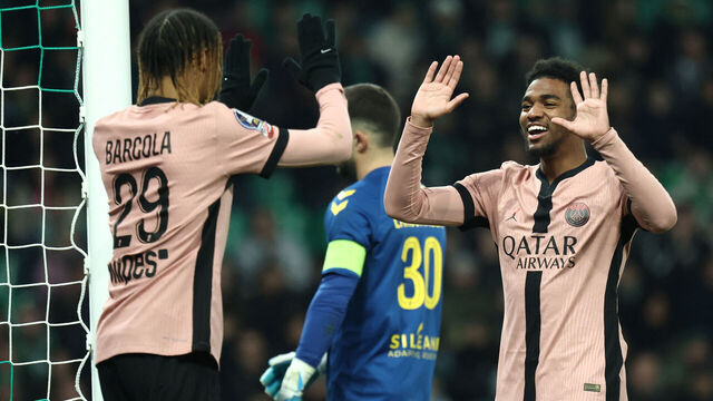 Paris Saint-Germain's French forward #49 Ibrahim Mbaye (R) celebrates scoring his team's sixth goal during the French L1 football match between AS Saint-Etienne and Paris Saint-Germain (PSG) at the Geoffroy-Guichard stadium in Saint-Etienne, central France on March 29, 2025.