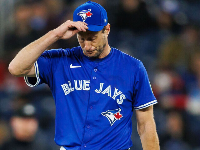 TORONTO, CANADA - MARCH 29: Max Scherzer #31 of the Toronto Blue Jays reacts on the mound as he pitches in the first inning of their MLB game against the Baltimore Orioles at Rogers Centre on March 29, 2025 in Toronto, Ontario, Canada.