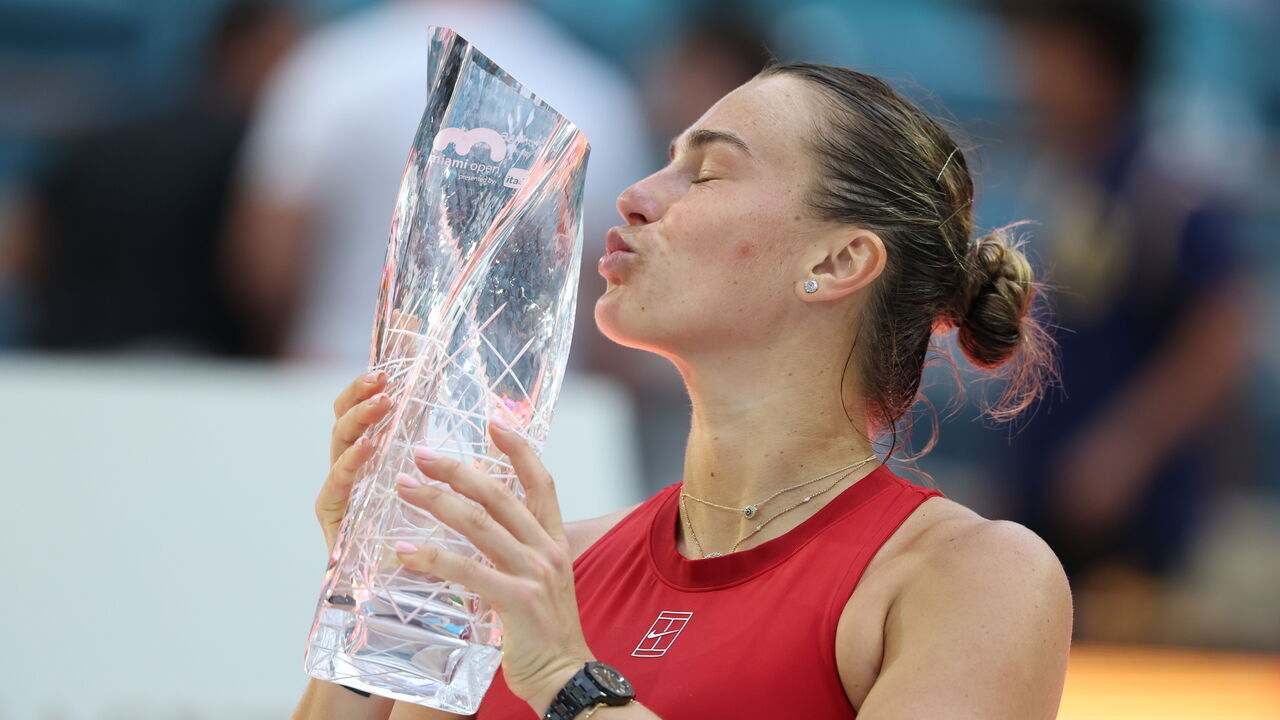 MIAMI GARDENS, FLORIDA - MARCH 29: Aryna Sabalenka poses with the Butch Buchholz Trophy following her victory against Jessica Pegula of the United States in the women's final on Day 12 of the Miami Open Presented by Itau 2025 at Hard Rock Stadium on March 29, 2025 in Miami Gardens, Florida.
