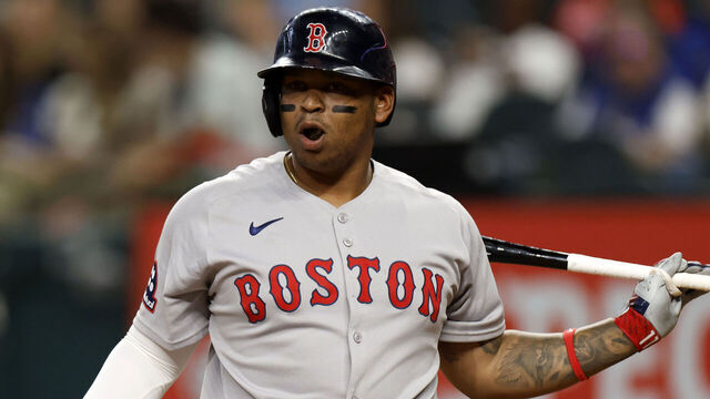 ARLINGTON, TX - MARCH 29: Rafael Devers #11 of the Boston Red Sox reacts during an at bat against the Texas Rangers during the second inning at Globe Life Field on March 29, 2025 in Arlington, Texas.