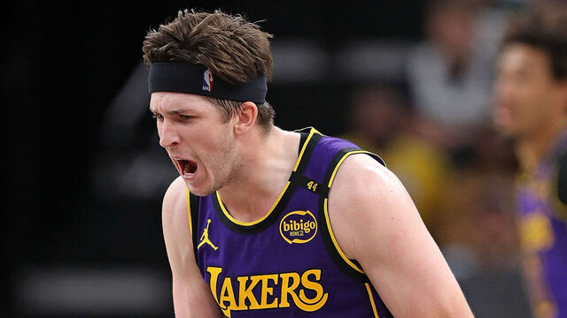 MEMPHIS, TENNESSEE - MARCH 29: Austin Reaves #15 of the Los Angeles Lakers reacts during the second half against the Memphis Grizzlies at FedExForum on March 29, 2025 in Memphis, Tennessee.