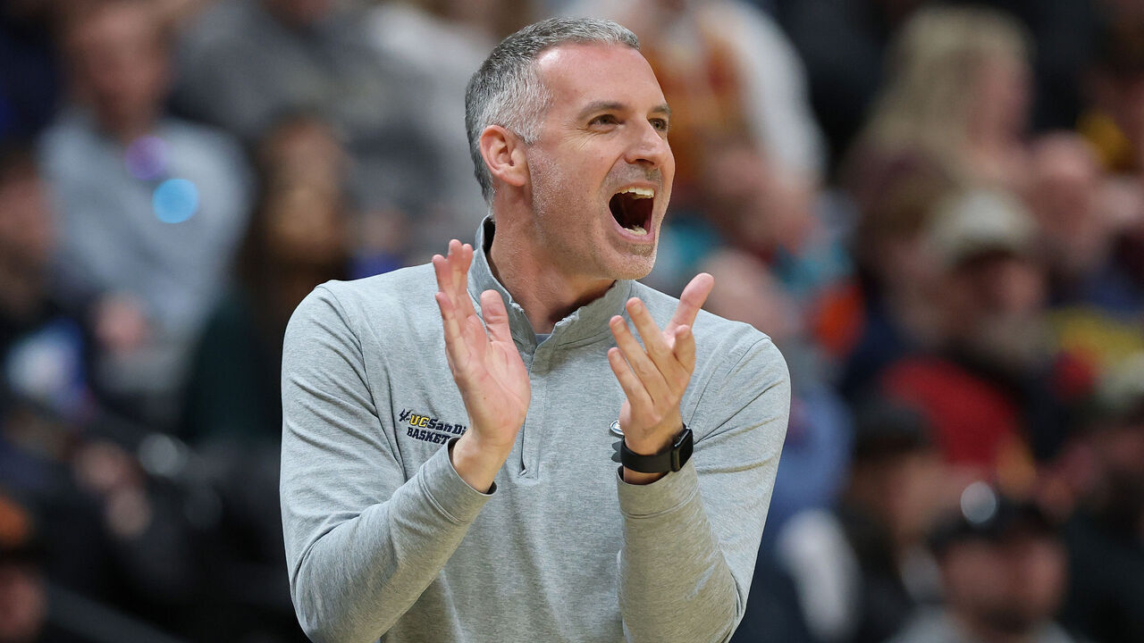 DENVER, COLORADO - MARCH 20: Head coach Eric Olen of the UC San Diego Tritons. reacts while playing the Michigan Wolverines during the first half in the first round of the NCAA Men's Basketball Tournament at Ball Arena on March 20, 2025 in Denver, Colorado.