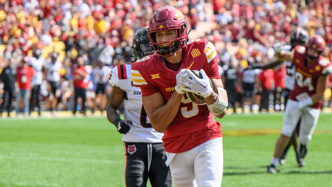 AMES, IOWA - SEPTEMBER 21, 2024: Jayden Higgins #9 of the Iowa State Cyclones scores a touchdown during a game against the Arkansas State Red Wolves at Jack Trice Stadium on September 21, 2024 in Ames, Iowa. The Cyclones beat the Red Wolves, 52-7.