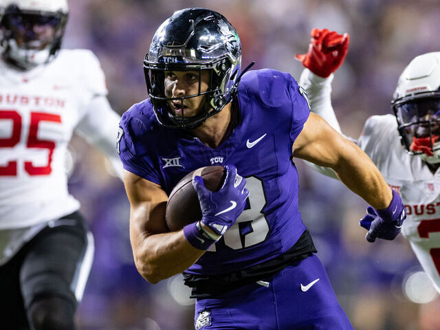 FORT WORTH, TX - OCTOBER 04: TCU Horned Frogs wide receiver Jack Bech (#18) breaks away from Houston Cougars cornerback Latrelll McCutchin Sr. (#1) and safety A.J. Haulcy (#2) for a touchdown during the Big 12 college football game between the Houston Cougars and TCU Horned Frogs on October 4, 2024 at Amon G. Carter Stadium in Fort Worth, TX.