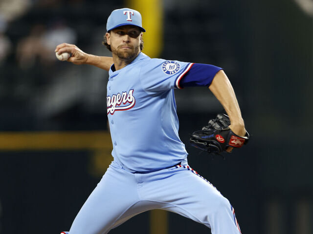 ARLINGTON, TX - MARCH 30: Jacob deGrom #48 of the Texas Rangers pitches against the Boston Red Sox during the first inning at Globe Life Field on March 30, 2025 in Arlington, Texas.