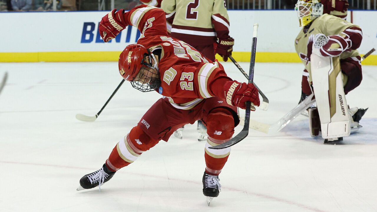 MANCHESTER, NEW HAMPSHIRE - MARCH 30: Eric Pohlkamp #23 of the Denver Pioneers celebrates his goal against the Boston College Eagles during the first period during the NCAA Division I Men's Ice Hockey Manchester Regional Championship final at the SNHU Arena on March 30, 2025 in Manchester, New Hampshire.