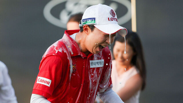 PHOENIX, ARIZONA - MARCH 30: Hyo Joo Kim of South Korea celebrates with her team after winning the playoff hole against Lilia Vu (not pictured) during the final round of the Ford Championship presented by Wild Horse Pass 2025 at Whirlwind Golf Club in Wild Horse Pass on March 30, 2025 in Phoenix, Arizona.