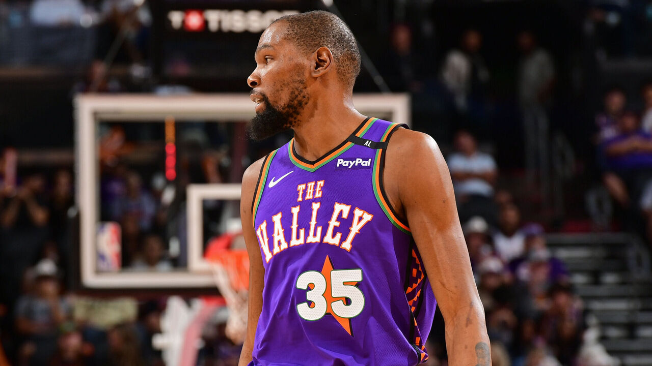 PHOENIX, AZ - MARCH 30: Kevin Durant #35 of the Phoenix Suns looks on during the game against the Houston Rockets on March 30, 2025 at PHX Arena in Phoenix, Arizona. Mandatory Copyright Notice: Copyright 2025 NBAE