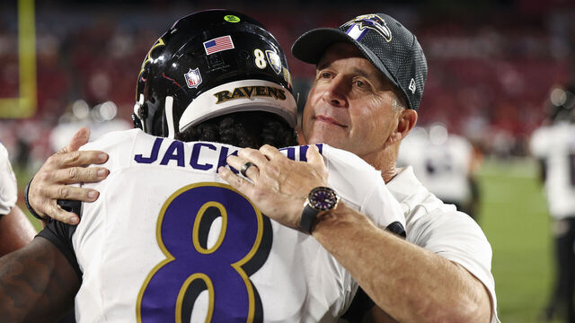 TAMPA, FLORIDA - OCTOBER 21: Lamar Jackson #8 of the Baltimore Ravens talks with John Harbaugh of the Baltimore Ravens prior to an NFL football game against the Tampa Bay Buccaneers at Raymond James Stadium on October 21, 2024 in Tampa, Florida.
