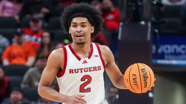 INDIANAPOLIS, INDIANA - MARCH 12: Dylan Harper #2 of the Rutgers Scarlet Knights brings the ball up court during the first half against the USC Trojans in the Big Ten Men's Basketball Tournament first round at Gainbridge Fieldhouse on March 12, 2025 in Indianapolis, Indiana.