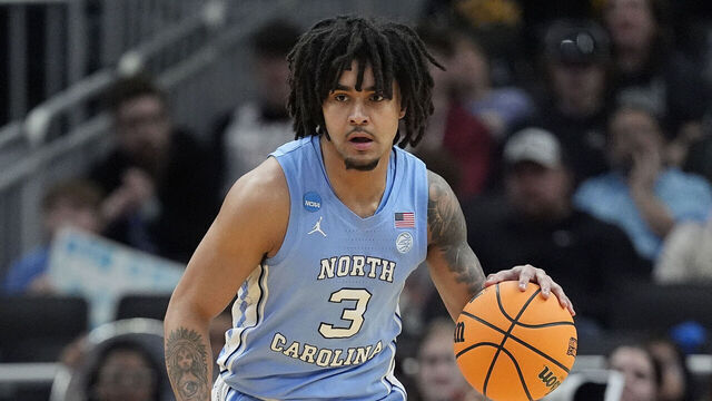 MILWAUKEE, WISCONSIN - MARCH 21: Elliot Cadeau #3 of the North Carolina Tar Heels dribbles the ball against the Ole Miss Rebels during the first half in the first round of the NCAA Men's Basketball Tournament at Fiserv Forum on March 21, 2025 in Milwaukee, Wisconsin.