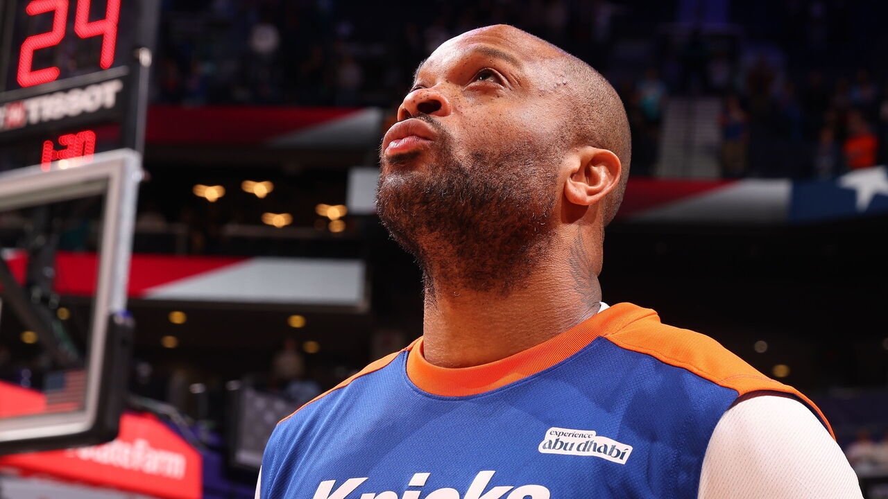 CHARLOTTE, NC - MARCH 20: P.J. Tucker of the New York Knicks stands for the National Anthem before the game against the Charlotte Hornets on March 20, 2025 at Spectrum Center in Charlotte, North Carolina. Mandatory Copyright Notice: Copyright 2025 NBAE
