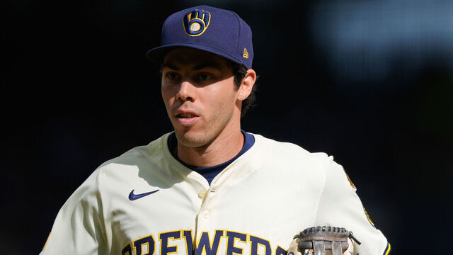 MILWAUKEE, WI - MARCH 31: Christian Yelich #22 of the Milwaukee Brewers runs back to the dugout in the seventh inning during the game between the Kansas City Royals and the Milwaukee Brewers at American Family Field on Monday, March 31, 2025 in Milwaukee, Wisconsin.