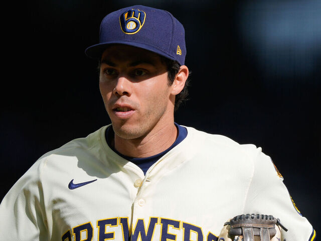 MILWAUKEE, WI - MARCH 31: Christian Yelich #22 of the Milwaukee Brewers runs back to the dugout in the seventh inning during the game between the Kansas City Royals and the Milwaukee Brewers at American Family Field on Monday, March 31, 2025 in Milwaukee, Wisconsin.