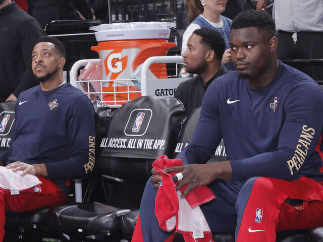 SACRAMENTO, CA - APRIL 11: CJ McCollum #3 and Zion Williamson #1 of the New Orleans Pelicans look on from the bench prior to the game against the Sacramento Kings on April 11, 2024 at Golden 1 Center in Sacramento, California. NOTE TO USER: User expressly acknowledges and agrees that, by downloading and or using this photograph, User is consenting to the terms and conditions of the Getty Images Agreement. Mandatory Copyright Notice: Copyright 2024 NBAE