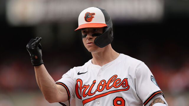 BALTIMORE, MARYLAND - MARCH 31: Tyler O'Neill #9 of the Baltimore Orioles celebrates after hitting a single against the Boston Red Sox in the third inning during their Opening Day game at Oriole Park at Camden Yards on March 31, 2025 in Baltimore, Maryland.