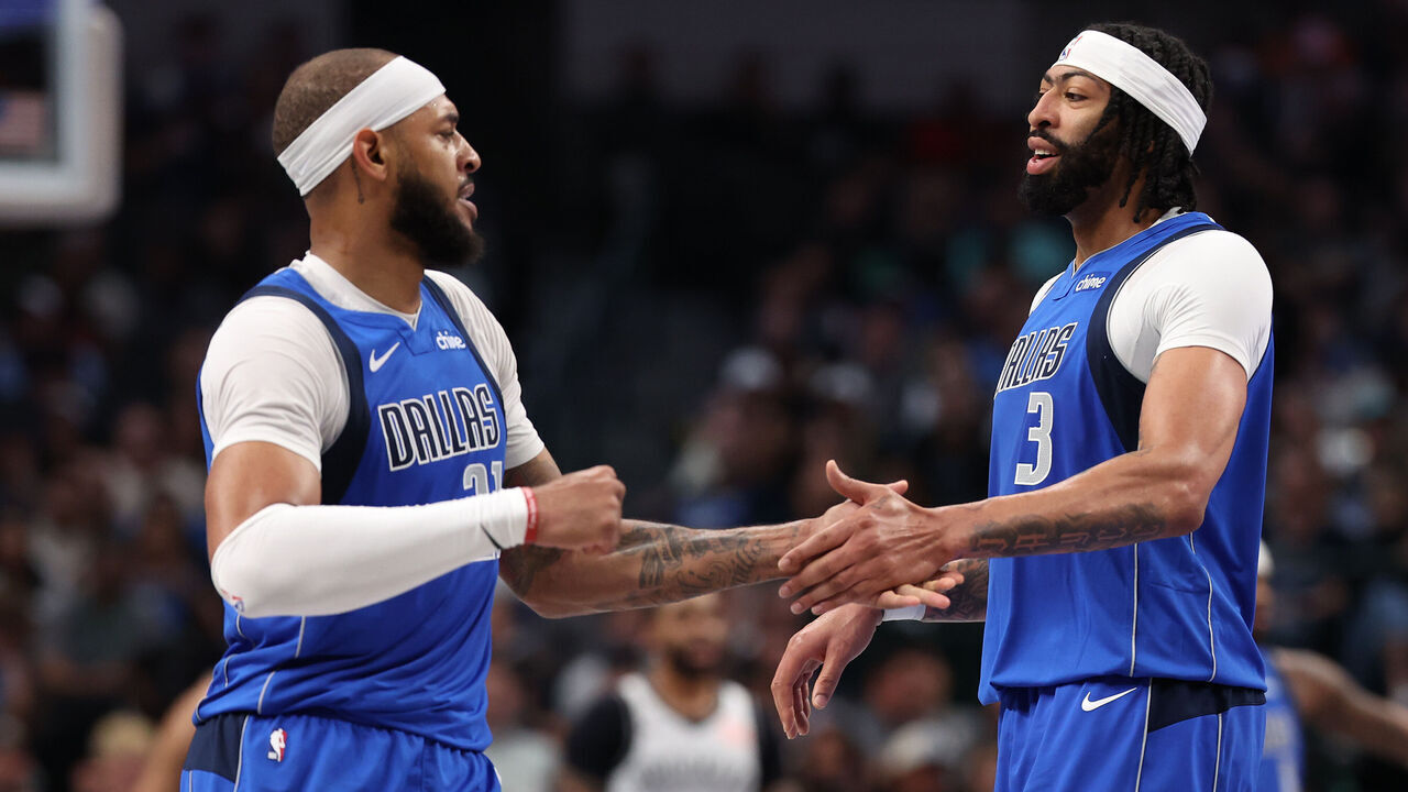 DALLAS, TEXAS - MARCH 31: Anthony Davis (R) #3 and Daniel Gafford #21 of the Dallas Mavericks celebrate together after a score during the second quarter against the Brooklyn Nets at American Airlines Center on March 31, 2025 in Dallas, Texas. NOTE TO USER: User expressly acknowledges and agrees that, by downloading and/or using this photograph, user is consenting to the terms and conditions of the Getty Images License Agreement.