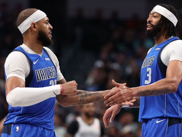 DALLAS, TEXAS - MARCH 31: Anthony Davis (R) #3 and Daniel Gafford #21 of the Dallas Mavericks celebrate together after a score during the second quarter against the Brooklyn Nets at American Airlines Center on March 31, 2025 in Dallas, Texas. NOTE TO USER: User expressly acknowledges and agrees that, by downloading and/or using this photograph, user is consenting to the terms and conditions of the Getty Images License Agreement.