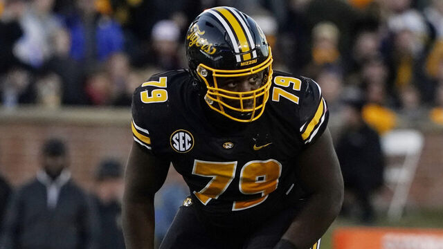COLUMBIA, MISSOURI - NOVEMBER 25: Offensive lineman Armand Membou #79 of the Missouri Tigers lines up against Arkansas Razorbacks in the second half at Faurot Field/Memorial Stadium on November 25, 2022 in Columbia, Missouri.