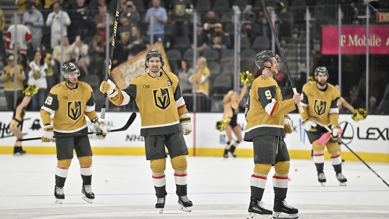 LAS VEGAS, NEVADA - MARCH 22: Vegas Golden Knights players celebrate after a victory against the Detroit Red Wings at T-Mobile Arena on March 22, 2025 in Las Vegas, Nevada.