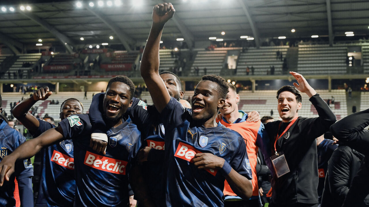 Reim's football soccers celebrate after winning the French Cup (Coupe de France) semi-final football match between AS Cannes and Stade de Reims at Pierre-de-Coubertin stadium in Cannes, southeastern France, on April 2, 2025.
