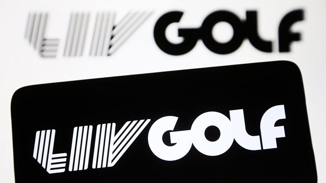 UKRAINE - 2024/01/05: In this photo illustration, LIV Golf logo is seen on a smartphone and in the background. (Photo Illustration by Pavlo Gonchar/SOPA Images/LightRocket via Getty Images)