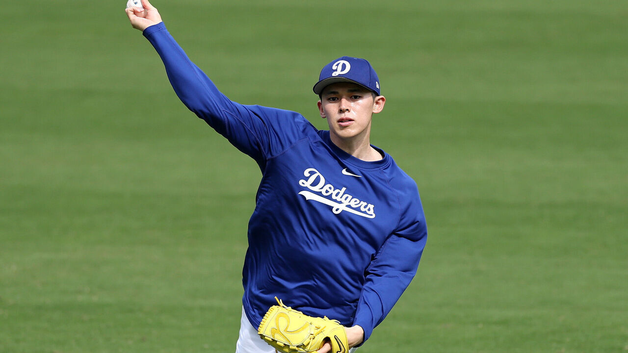 LOS ANGELES, CALIFORNIA - MARCH 31: Roki Sasaki #11 of the Los Angeles Dodgers warms up before the game against the Atlanta Braves at Dodger Stadium on March 31, 2025 in Los Angeles, California.