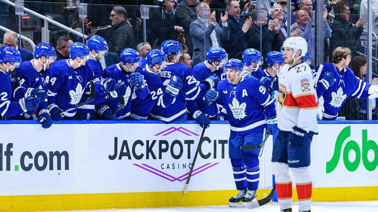 TORONTO, ON - APRIL 02: Toronto Maple Leafs Center John Tavares (91) celebrates his goal by the team bench during the second period of the NHL regular season game between the Florida Panthers and the Toronto Maple Leafs on April 2, 2025, at Scotiabank Arena in Toronto, ON, Canada.