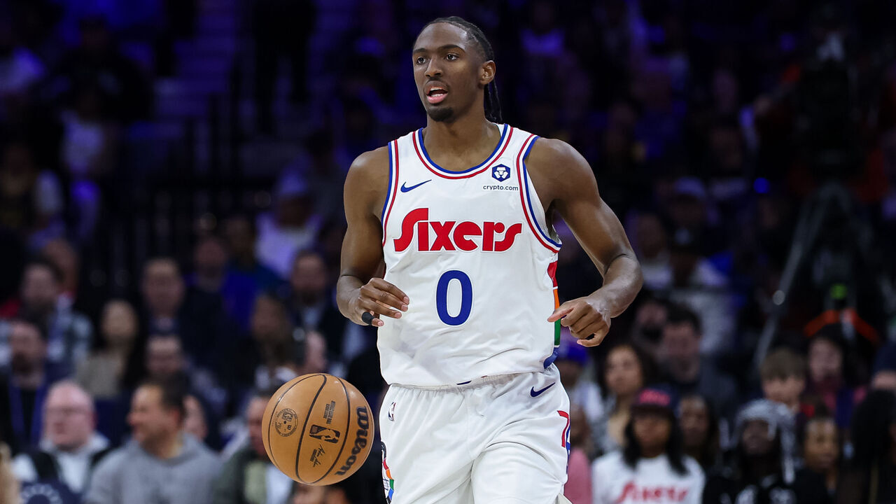 PHILADELPHIA, PENNSYLVANIA - MARCH 01: Tyrese Maxey #0 of the Philadelphia 76ers brings the ball up court against the Golden State Warriors during the second half of the game at the Wells Fargo Center on March 1, 2025 in Philadelphia, Pennsylvania.
