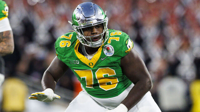 PASADENA, CALIFORNIA - JANUARY 1: Josh Conerly Jr. #76 of the Oregon Ducks blocks in the second half during the Rose Bowl against Ohio State Buckeyes at Rose Bowl Stadium on January 1, 2025 in Pasadena, California.