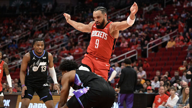 HOUSTON, TEXAS - APRIL 02: Dillon Brooks #9 of the Houston Rockets kicks Collin Sexton #2 of the Utah Jazz during the first period at Toyota Center on April 02, 2025 in Houston, Texas. NOTE TO USER: User expressly acknowledges and agrees that, by downloading and/or using this photograph, user is consenting to the terms and conditions of the Getty Images License Agreement.