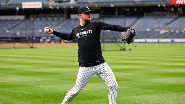 NEW YORK, NY - APRIL 02: Clarke Schmidt #36 of the New York Yankees warms up before the game against the Arizona Diamondbacks at Yankee Stadium on April 2, 2025 in New York, New York.