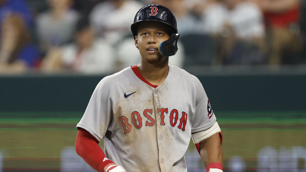 ARLINGTON, TX - MARCH 30: Kristian Campbell #28 of the Boston Red Sox looks on after striking out against the Texas Rangers at Globe Life Field on March 30, 2025 in Arlington, Texas.