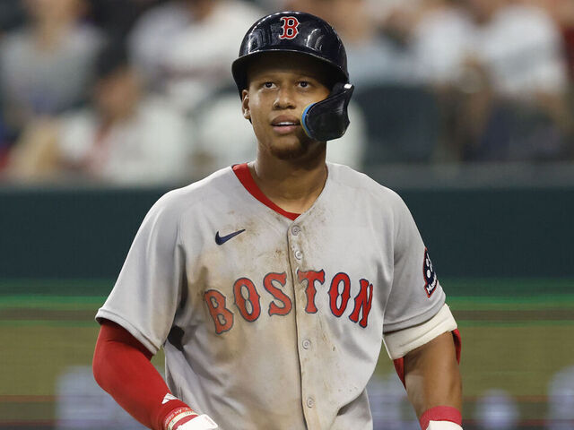 ARLINGTON, TX - MARCH 30: Kristian Campbell #28 of the Boston Red Sox looks on after striking out against the Texas Rangers at Globe Life Field on March 30, 2025 in Arlington, Texas.