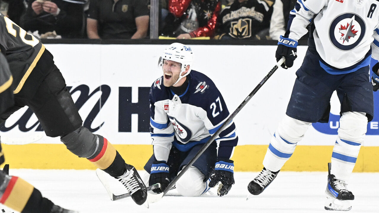 LAS VEGAS, NEVADA - APRIL 03: Nikolaj Ehlers #27 of the Winnipeg Jets reacts after blocking a shot from the Vegas Golden Knights in the first period of their game at T-Mobile Arena on April 03, 2025 in Las Vegas, Nevada.
