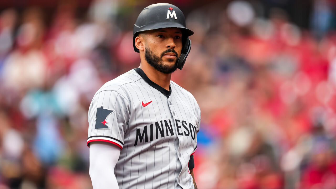 ST LOUIS, MO - MARCH 29: Carlos Correa #4 of the Minnesota Twins looks on against the St. Louis Cardinals on March 29, 2025 at Busch Stadium in St. Louis, Missouri.