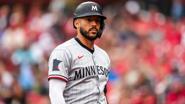 ST LOUIS, MO - MARCH 29: Carlos Correa #4 of the Minnesota Twins looks on against the St. Louis Cardinals on March 29, 2025 at Busch Stadium in St. Louis, Missouri.